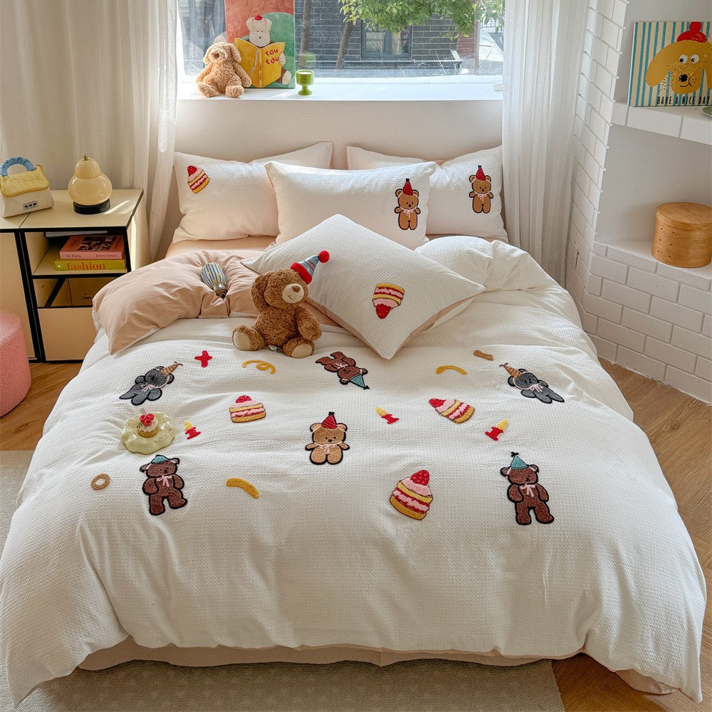 Quilted cotton bedding with cherry embroidery and reversible pillowcases