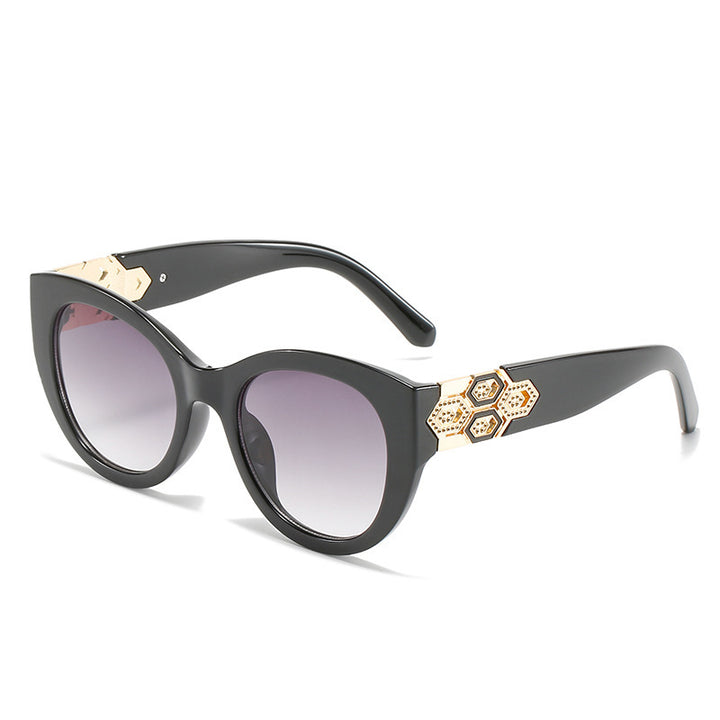 Fashion-Forward Cat-Eye Sunglasses with Decorative Accents Stornfield