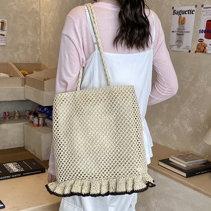 Handcrafted straw bag with fringed hem Stornfield