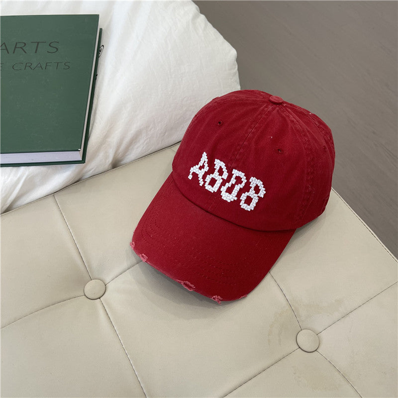 Women's Distressed Cotton Baseball Cap with Graphic Detailing Stornfield