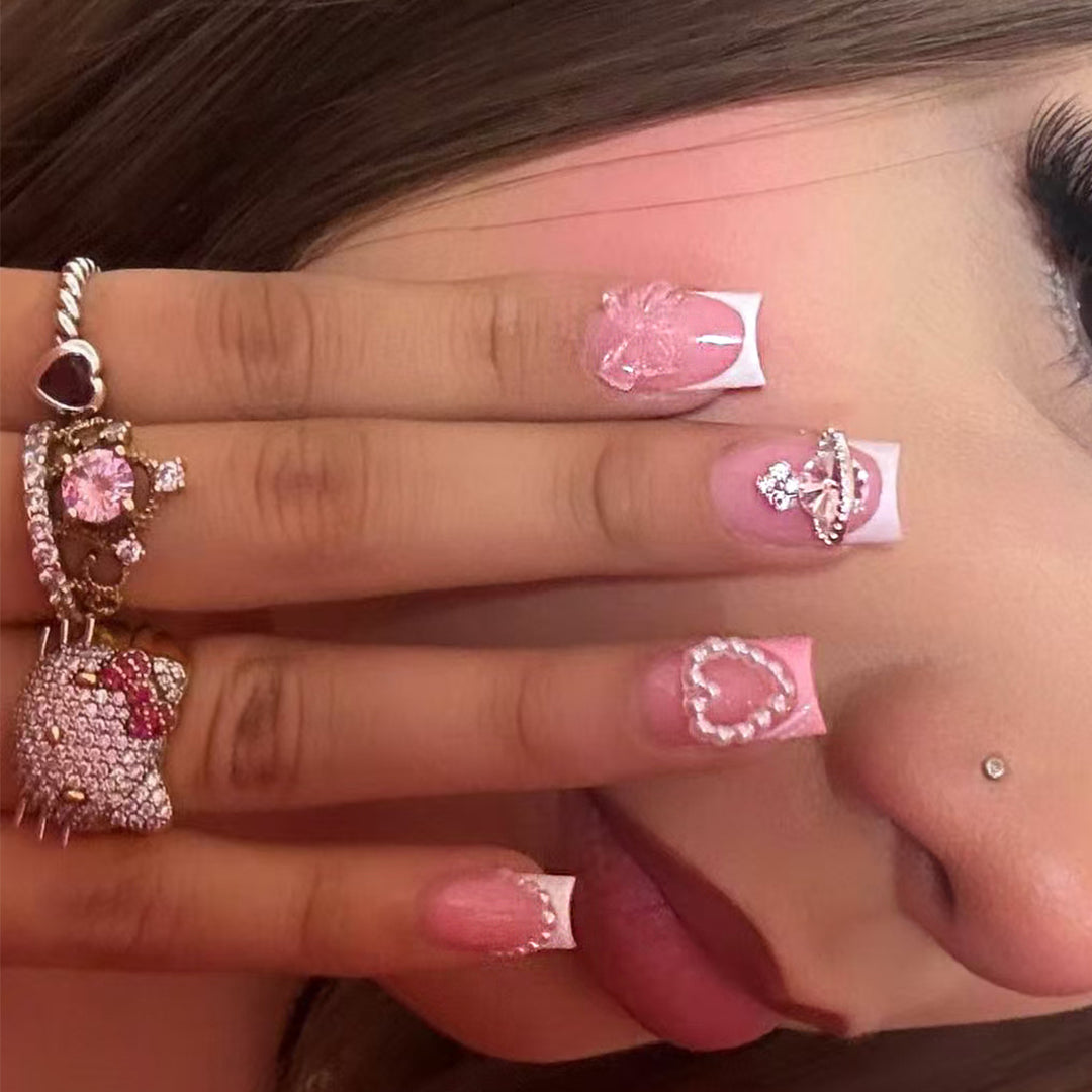 Artificial nails with romantic 3D applications Stornfield