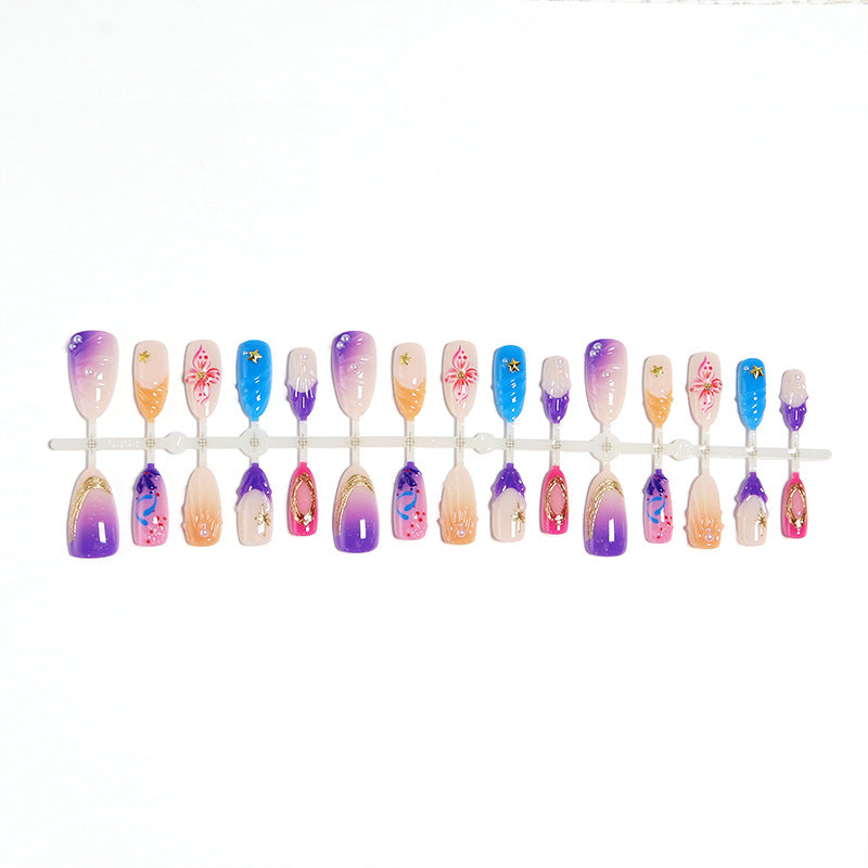 Creative nail art set with floral and glamorous embellishments Stornfield