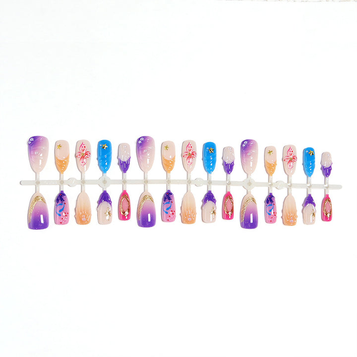 Creative nail art set with floral and glamorous embellishments Stornfield