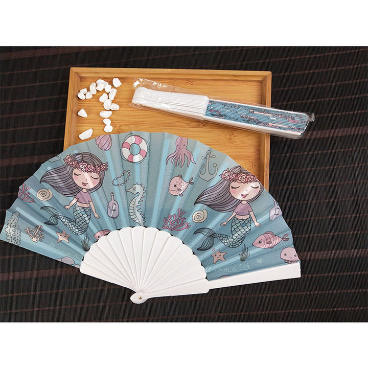 Women folding hand fan with shimmering scale pattern Stornfield