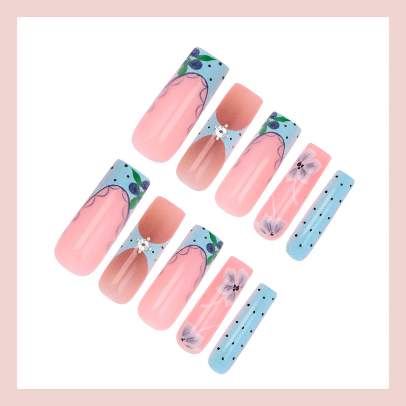 Artificial nail set with floral designs Stornfield