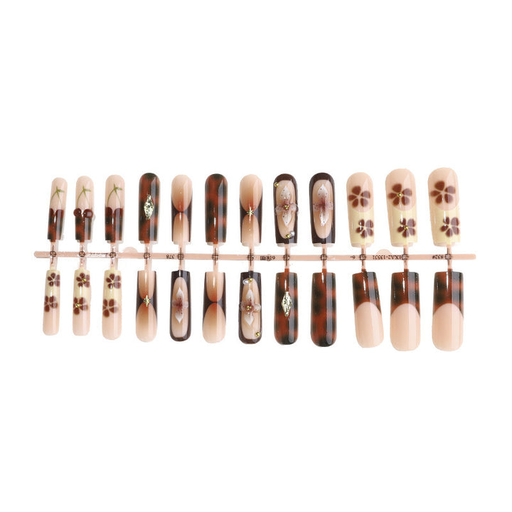Nail set with floral accents and glitter accents Stornfield