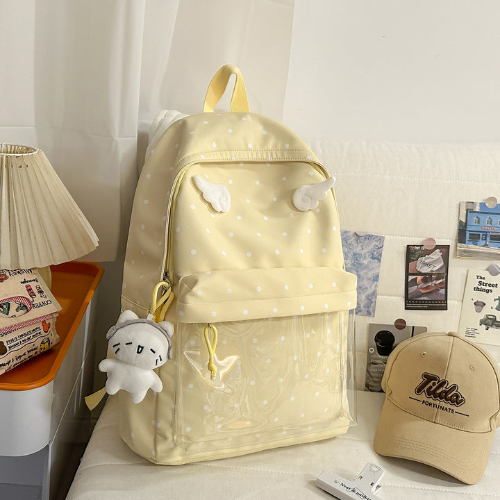 Polka Dot Patterned Backpack with Playful Wing Accents Stornfield