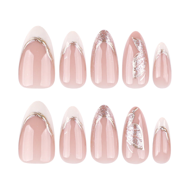 Elegant Stiletto Nails with Glitter and Spike Decorations Stornfield