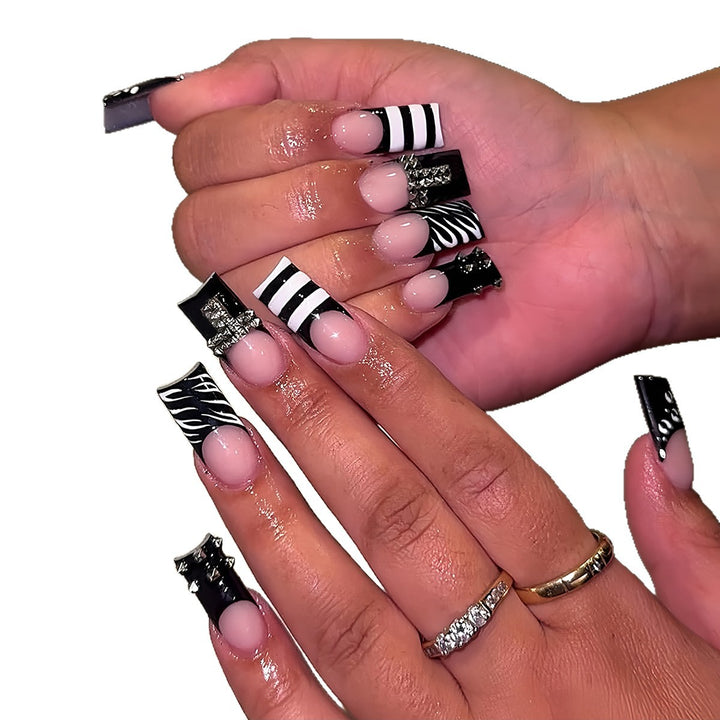Artificial Nails in Modern Stripe and Zebra Design Stornfield