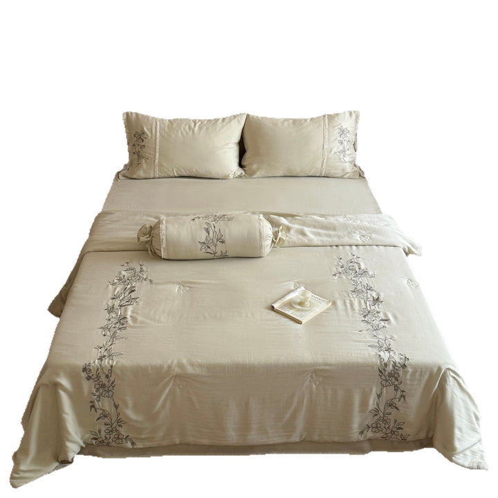 Elegant bedding set made of cotton satin with floral embroidered border and decorative roll cushion Stornfield