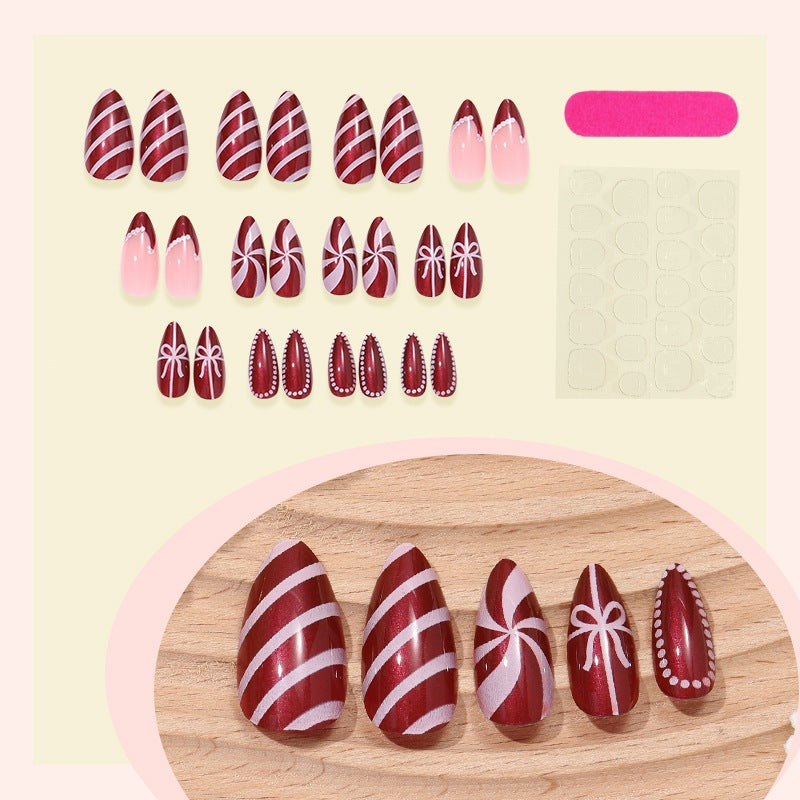 Creative nail art set with festive caramel and stripe designs Stornfield