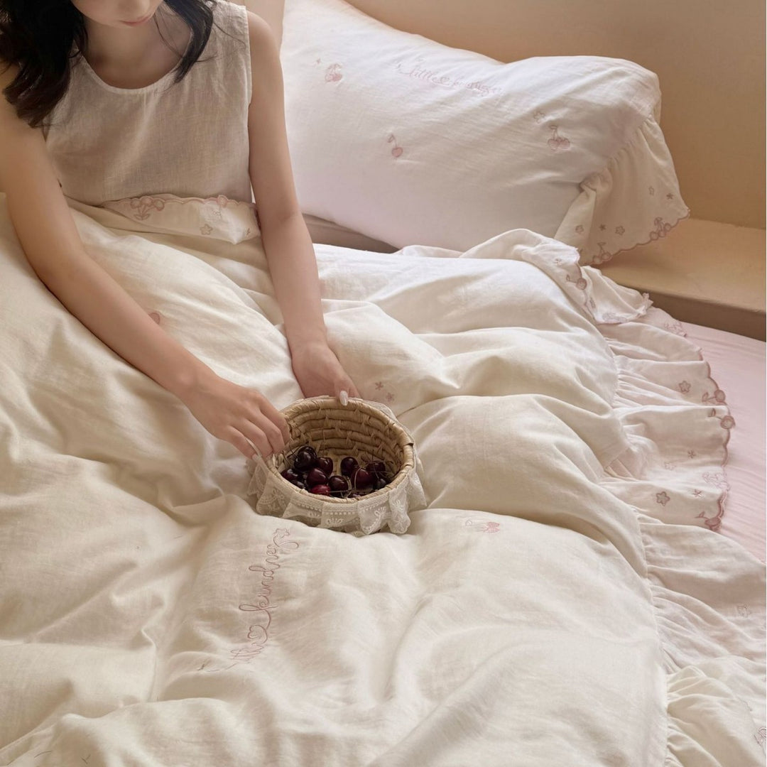 Romantic cotton bedding set with ruffles and delicate embroidery