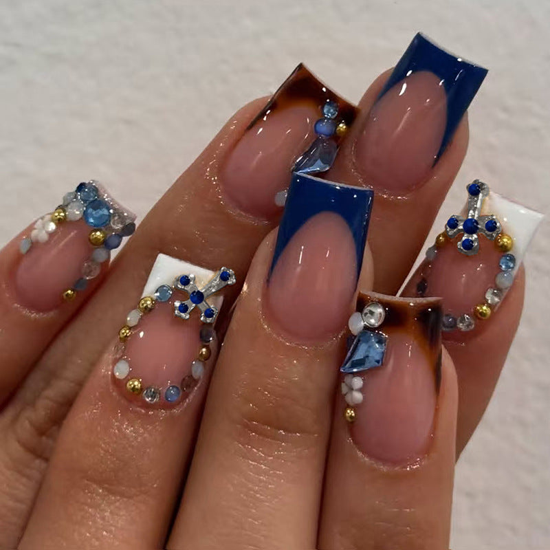Artificial nail set with elegant stone embellishments and modern accents Stornfield