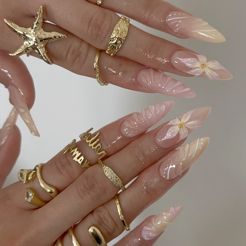 Artistic Long-Lasting Press-On Nail Extensions with Floral Patterns Stornfield