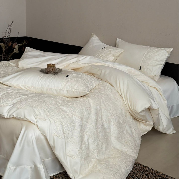 Luxurious cotton satin bedding set with embroidered leaf relief