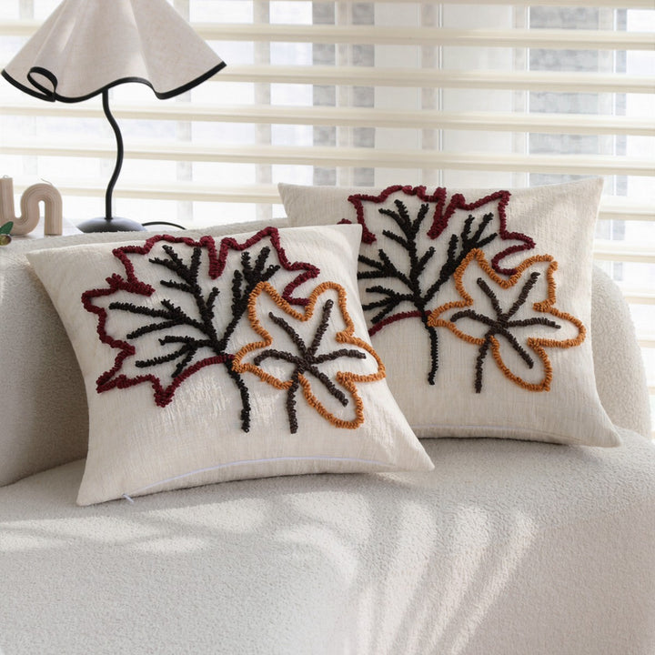 Decorative cushion with autumn leaf design