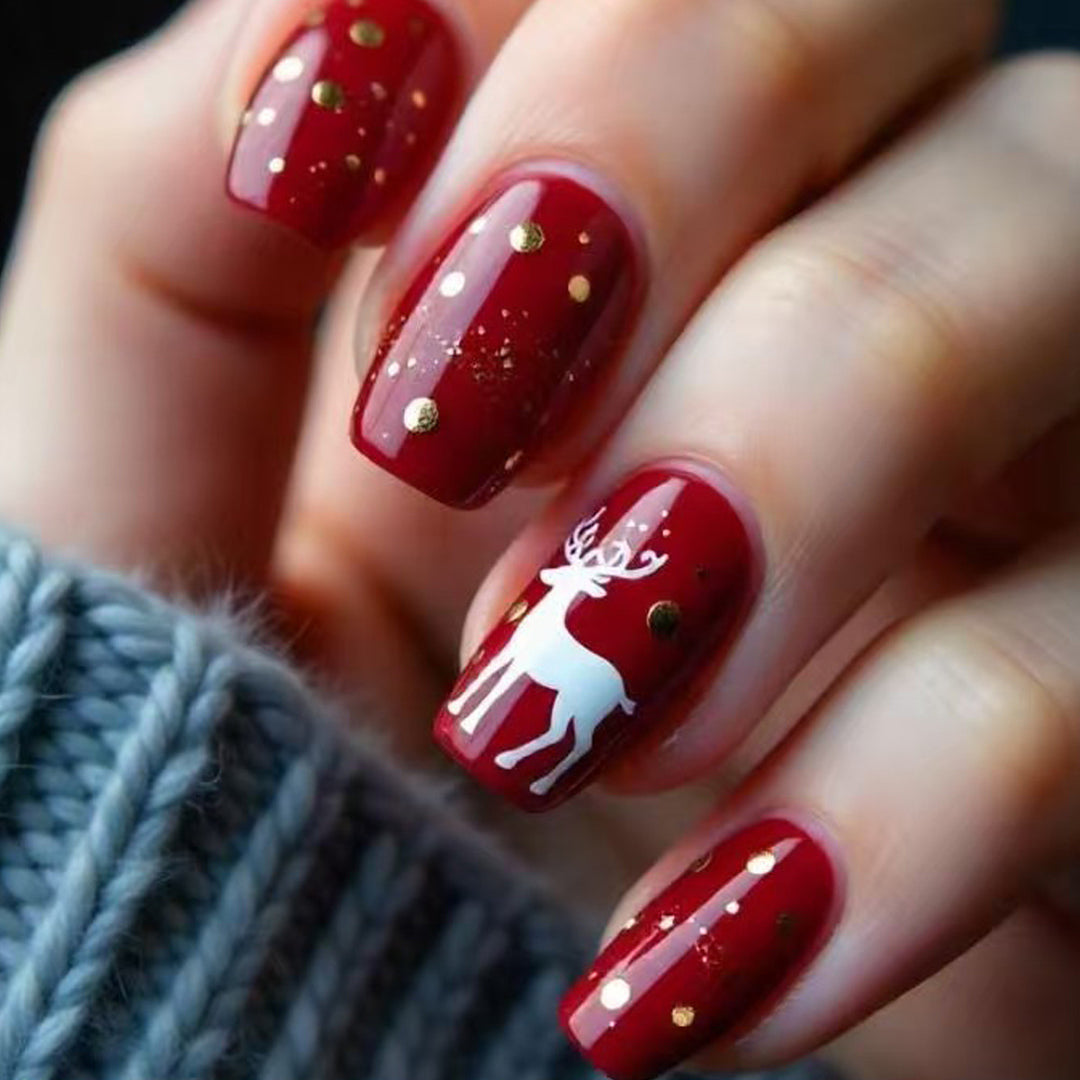 Creative artificial nails with festive reindeer design Stornfield