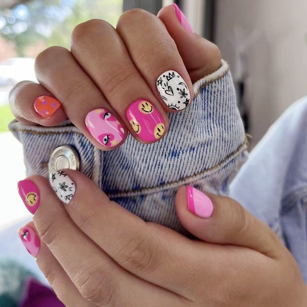 Artistic Press-On Nail Art Set with Playful Designs Stornfield