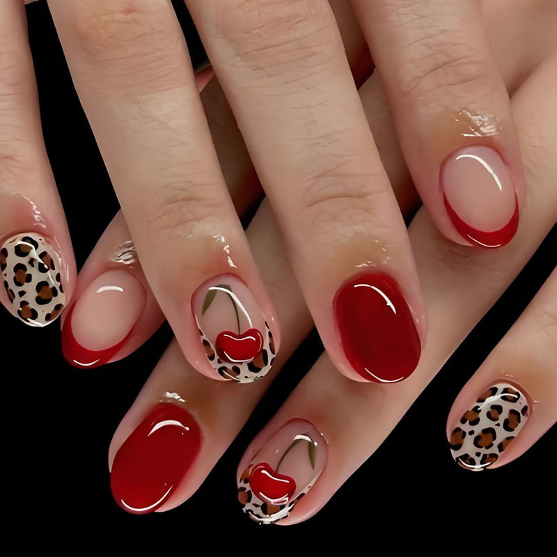 Artificial nail set with trendy leopard and cherry designs Stornfield