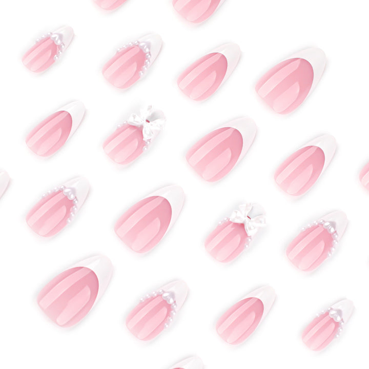 Artful Nail Extensions with Bead and Bow Designs Stornfield