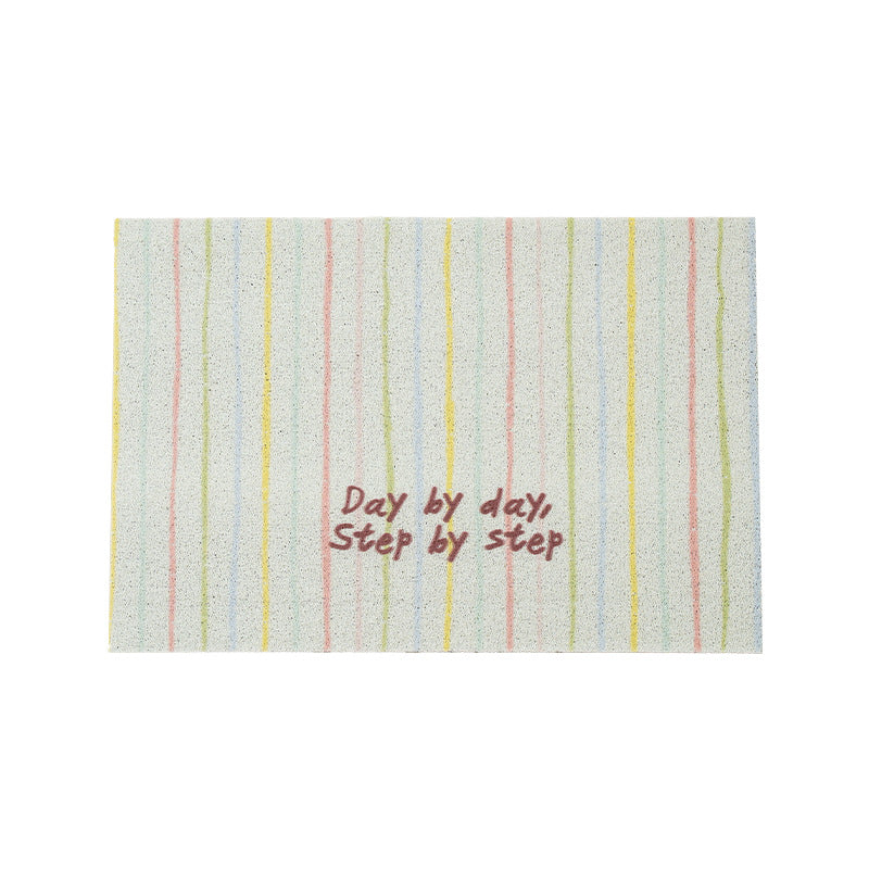 Durable entrance doormat with striped texture and "Welcome" lettering Stornfield
