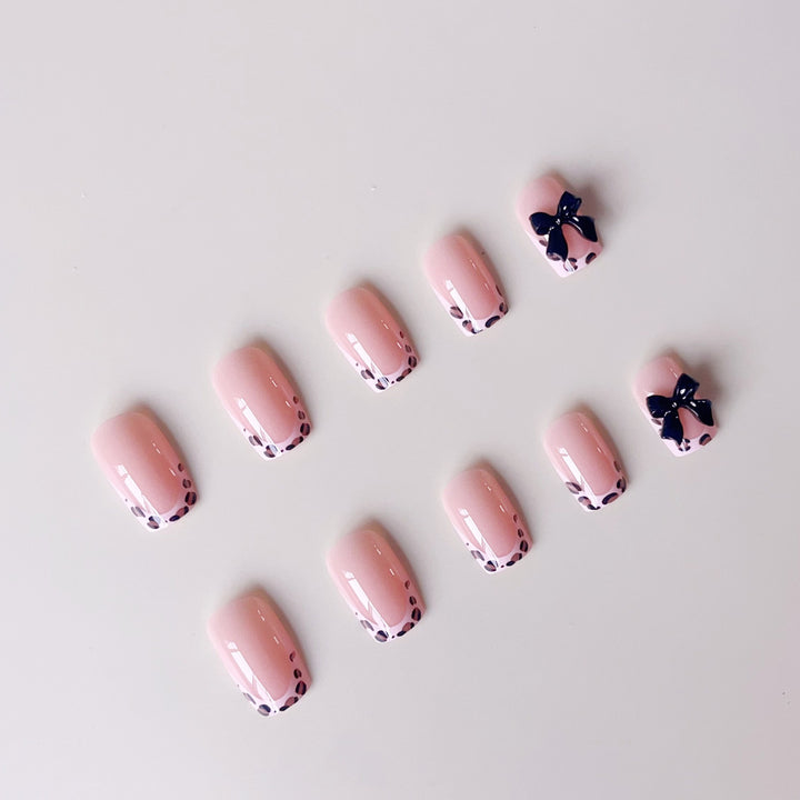 Artificial nail set with elegant 3D bows and leopard design Stornfield