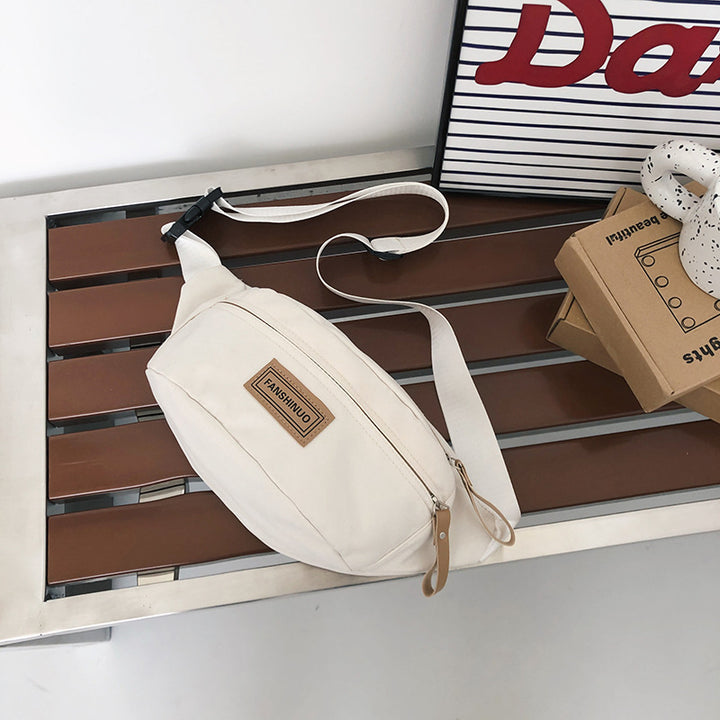 Sleek Multi-Compartment Sling Bag