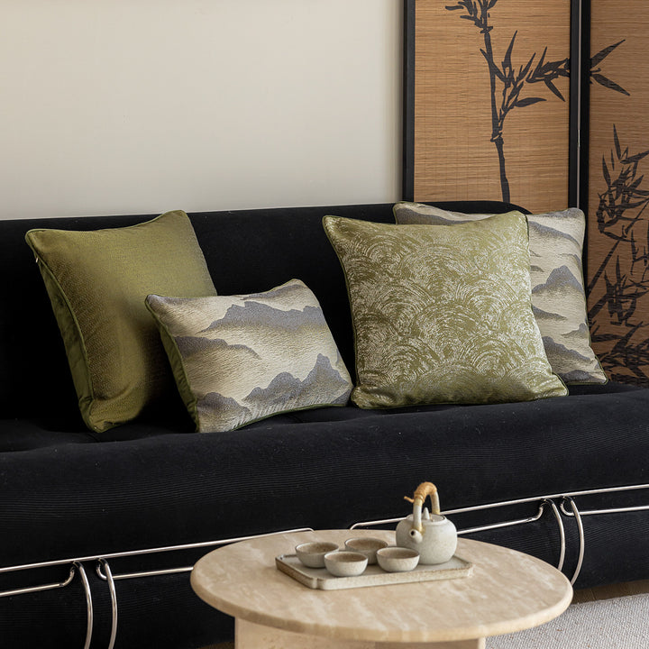 Elegant decorative pillow with elaborate mountain motif
