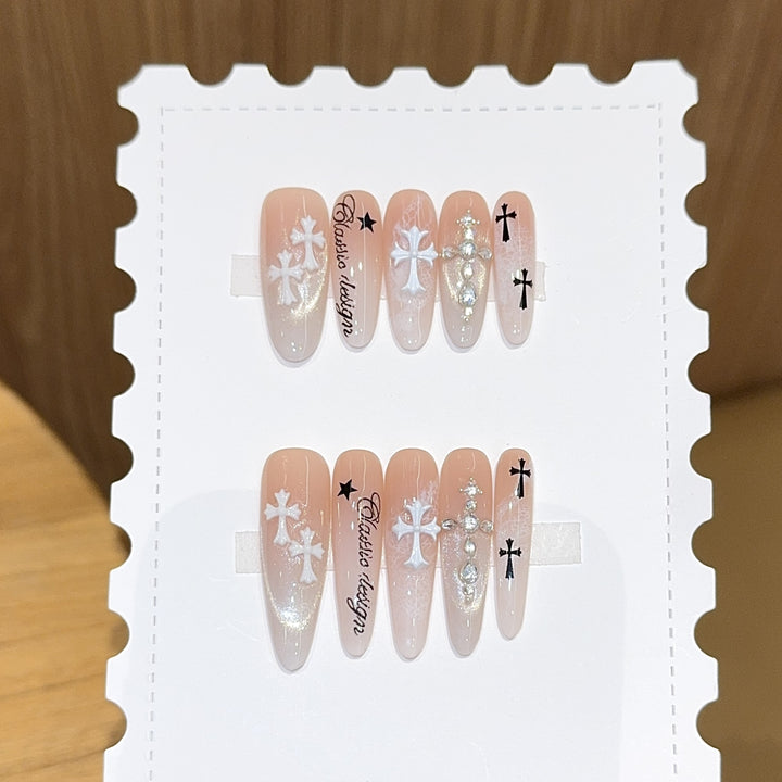 Artificial nail tips with cross and glitter motifs Stornfield