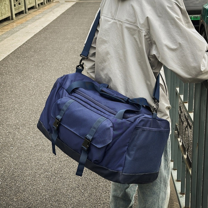 Sport and leisure travel bag with water-repellent material and reinforced carrying handle Stornfield