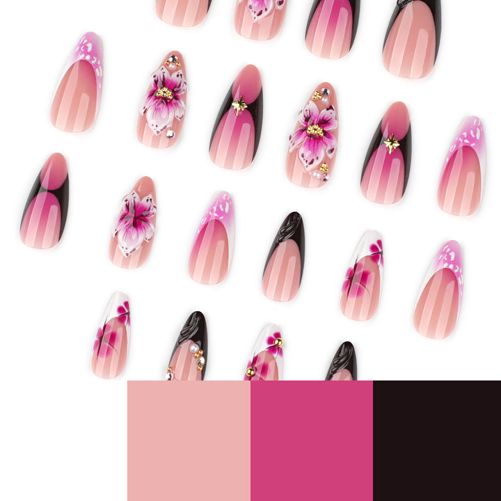 Artful stiletto nails with blooming design and glitter accents Stornfield