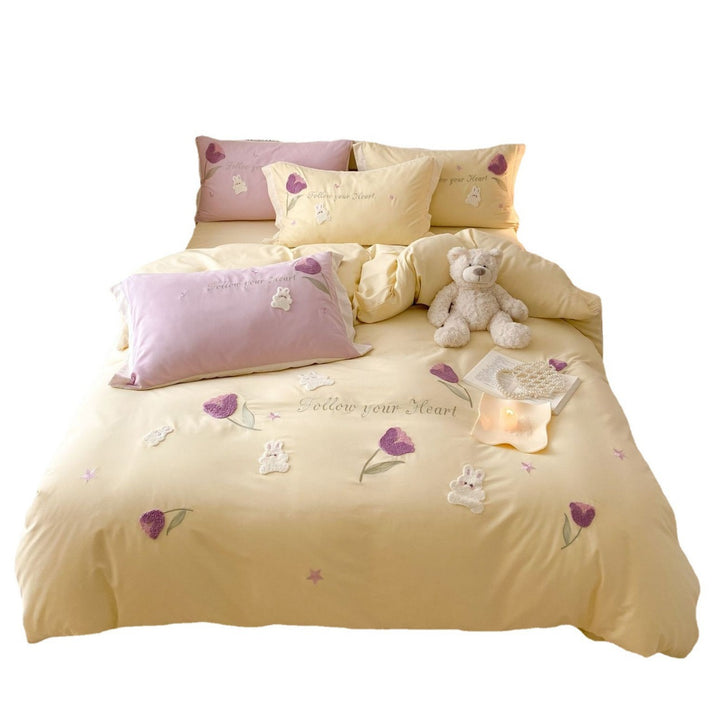 Romantic cotton satin bedding set with embroidered rabbit and flower appliqués