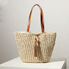 Handcrafted basket bag with fashionable tassel detail Stornfield