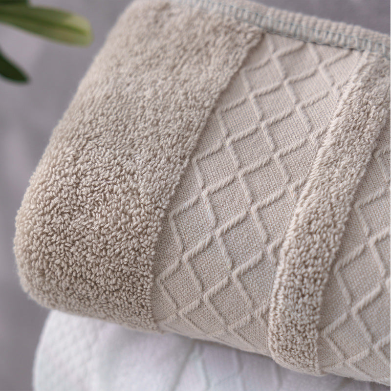 Large premium terry bath towel with decorative structure border