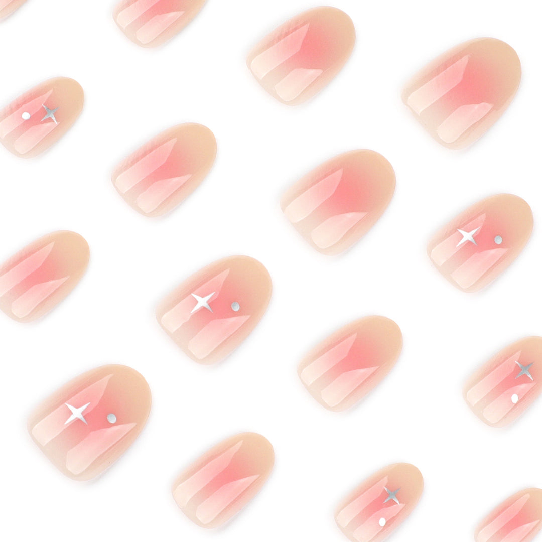 Artful nail extensions with shiny rhinestone accents Stornfield