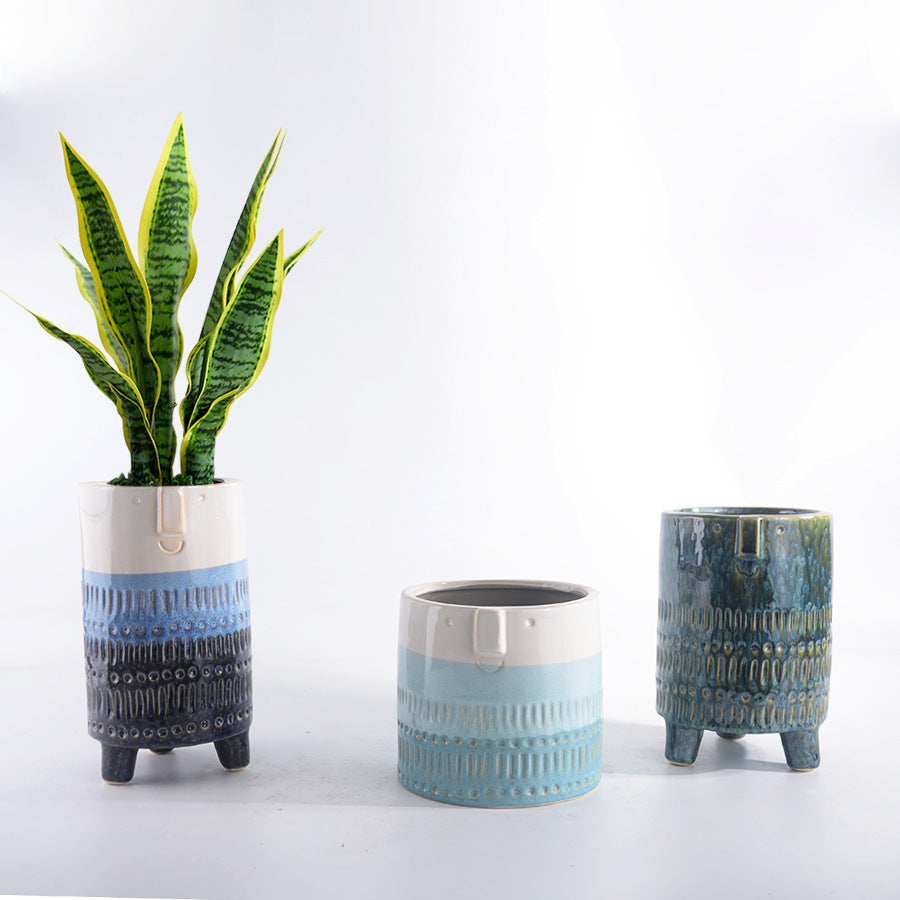 Decorative plant pot with facial features Stornfield