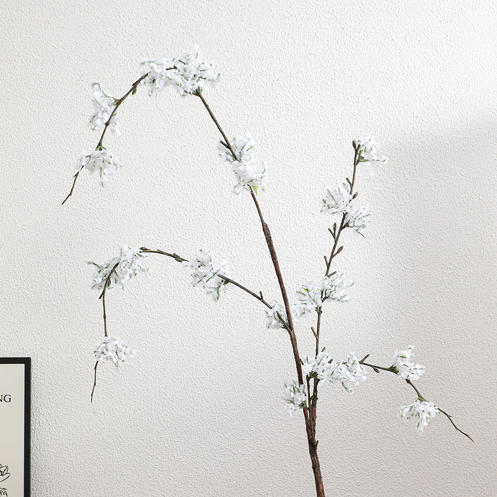 Artificial cherry blossom branch with lifelike details