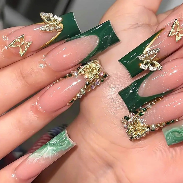 Artificial nails in elegant design with glitter and flower accents Stornfield