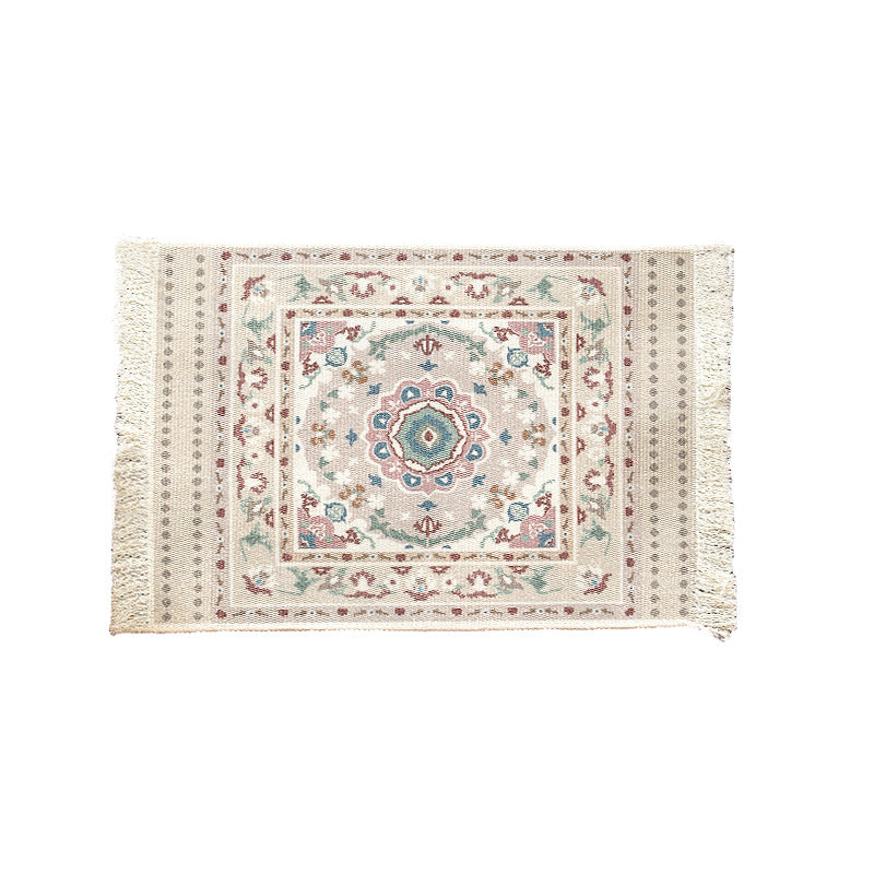 Woven small runner rug in vintage ornamental style with fringes