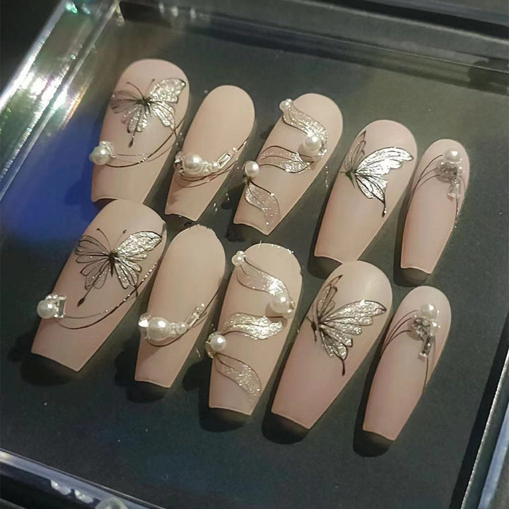 Artificial nails with filigree butterfly design Stornfield
