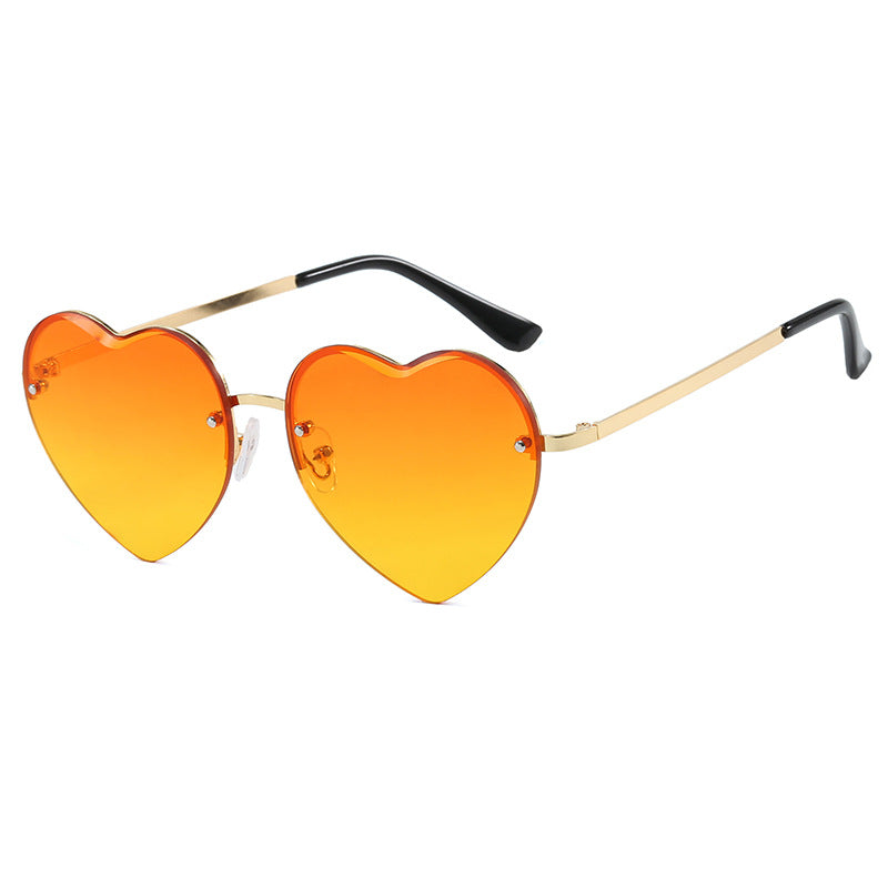 Women's Heart-Shaped Sunglasses with Mirrored Lenses and Fashionable Metal Frame Stornfield