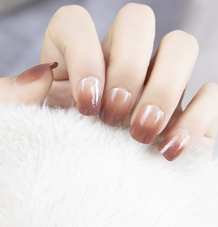 Elegant nail design with pearl embellishment Stornfield