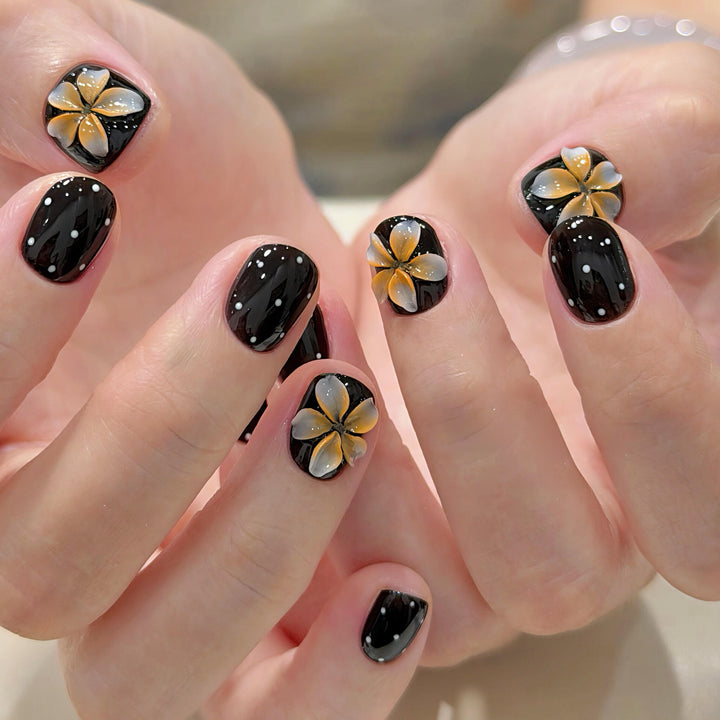 Artificial nails with floral accents and elegant shine Stornfield