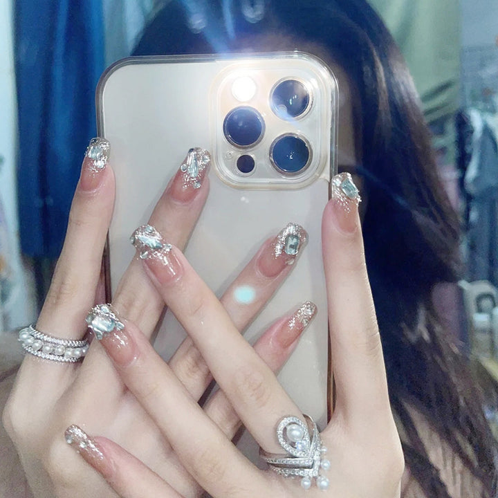 Artificial nails with elegant rhinestone accents Stornfield