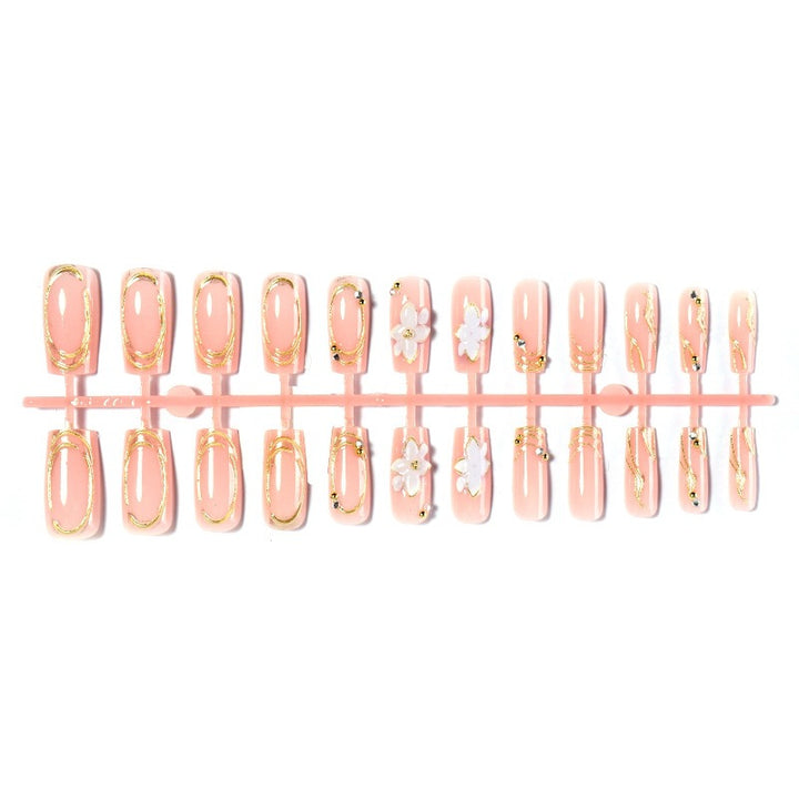 Elegant artificial nail set with decorative flower and gold embellishments Stornfield