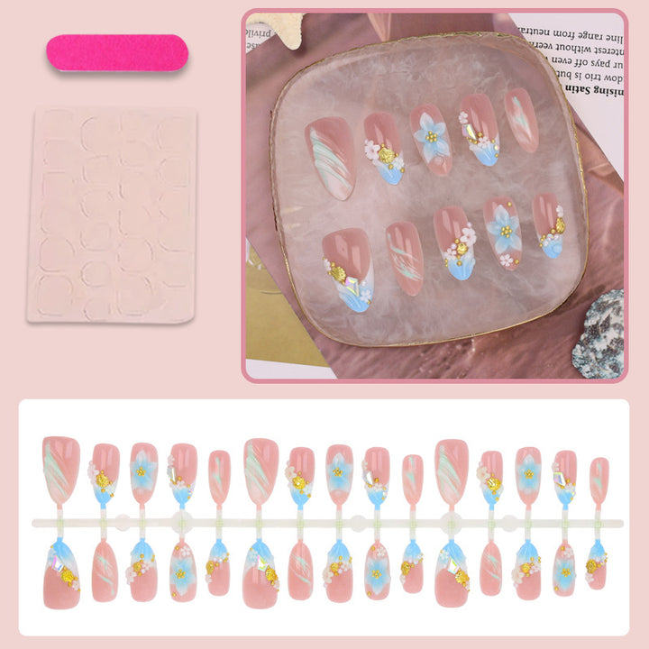 Artificial nail set with elaborate floral accents Stornfield
