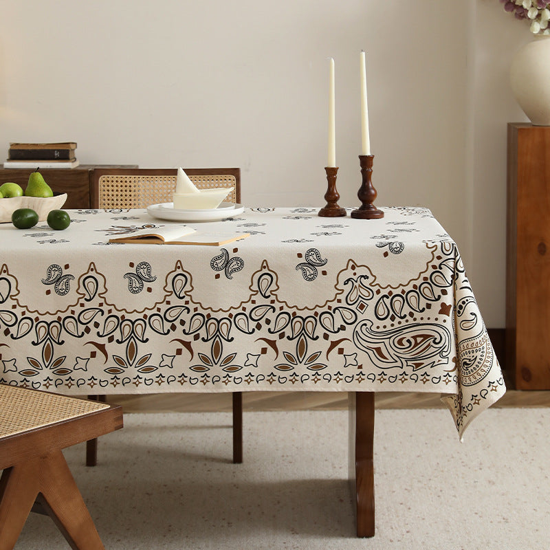 Printed rectangular tablecloth made of cotton blend with paisley border Stornfield