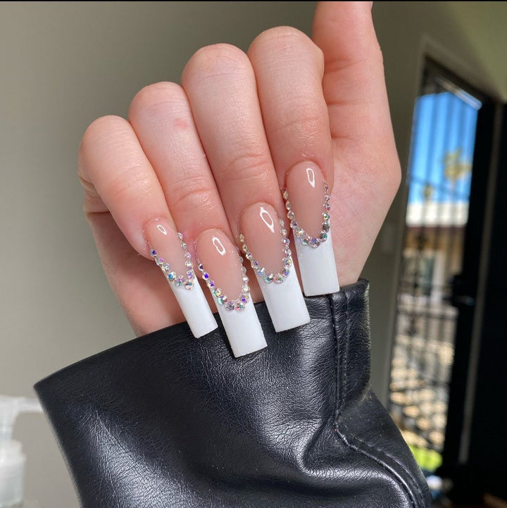 Artificial nail set with glamorous rhinestones and elegant tip decorations Stornfield