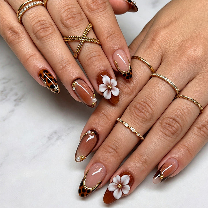 Elegant artificial nails with floral and animal motifs Stornfield
