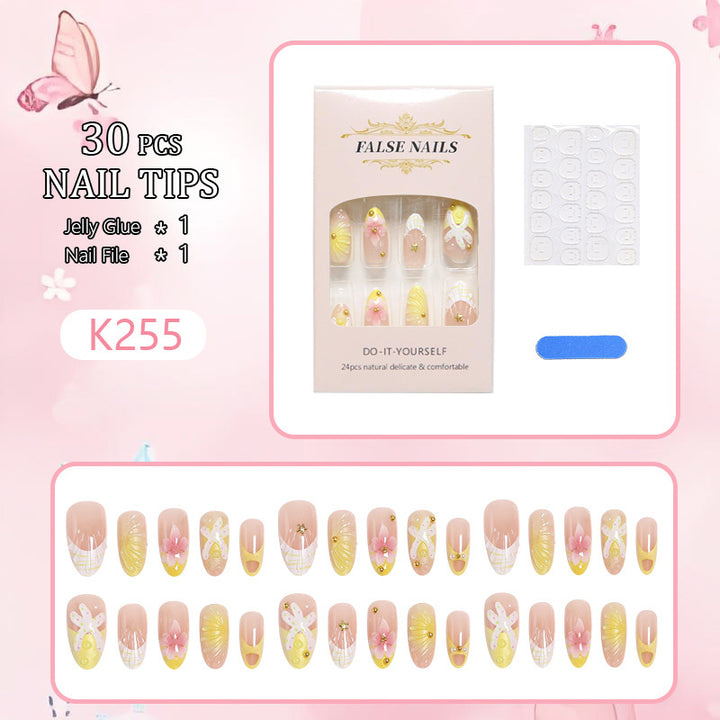 Artificial nails with floral glitter pattern Stornfield